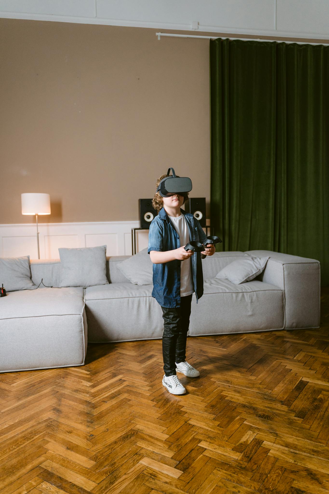 Teenager immersed in virtual reality gaming in a cozy modern living room with stylish decor.
